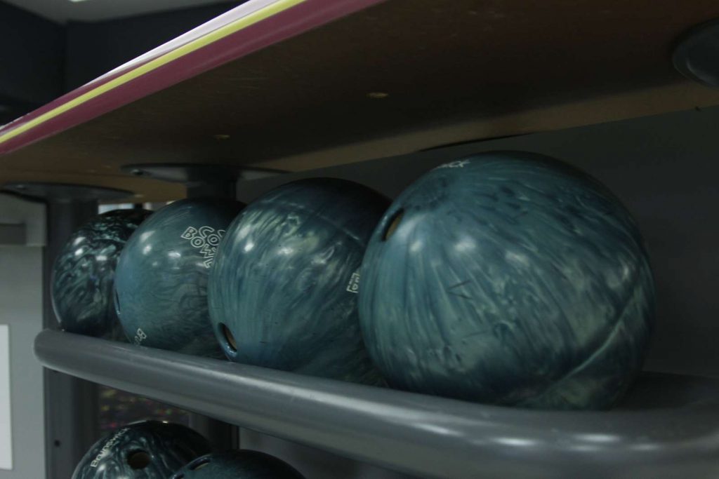 Bowling balls on a rack Bowling balls on a rack